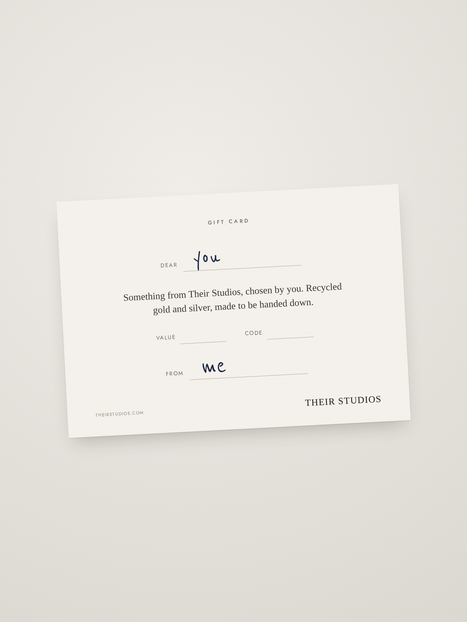 Their Studios gift card with a handwritten note